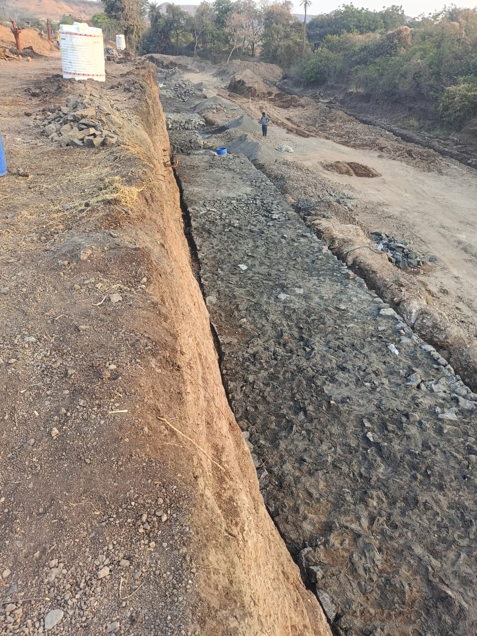 Deep foundation trench excavation with stone pitching